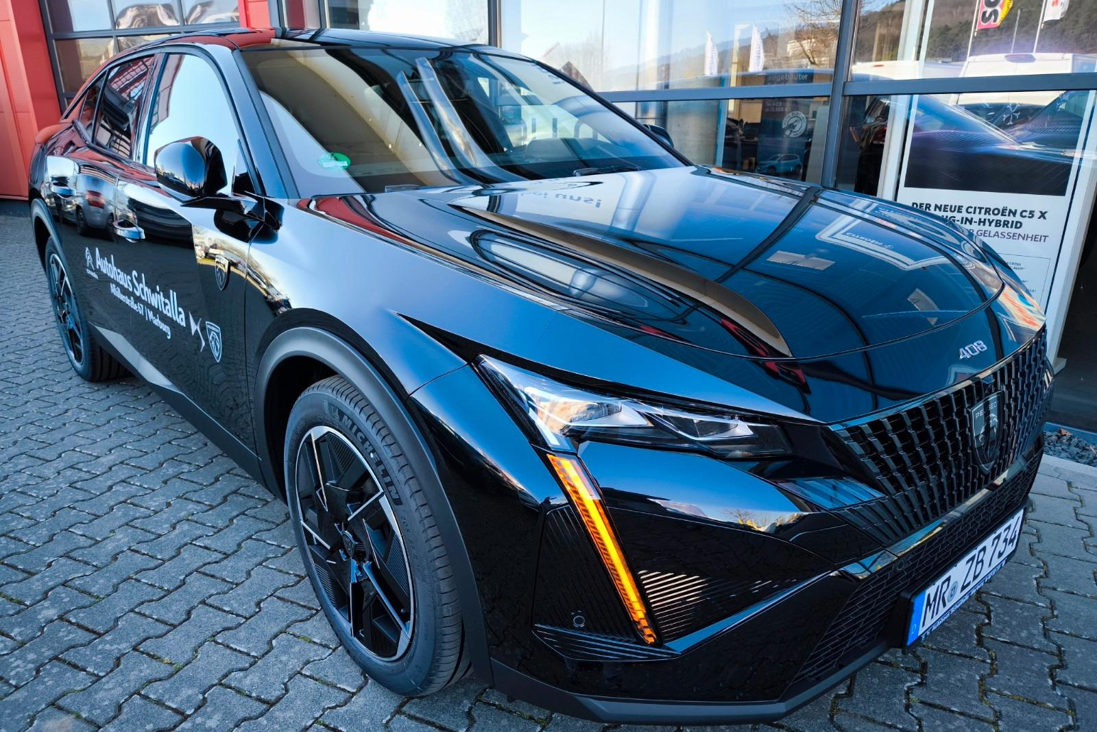 Peugeot 408 GT HYBRID 145 e-DSC6 0000